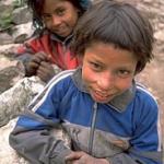 A brother and sister on their way to school in Kermi (9,150'), Nepal.