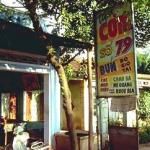 Roadside sign for a restaurant. If you love eating the local food, there is no shortage of it anywhere along Highway One.