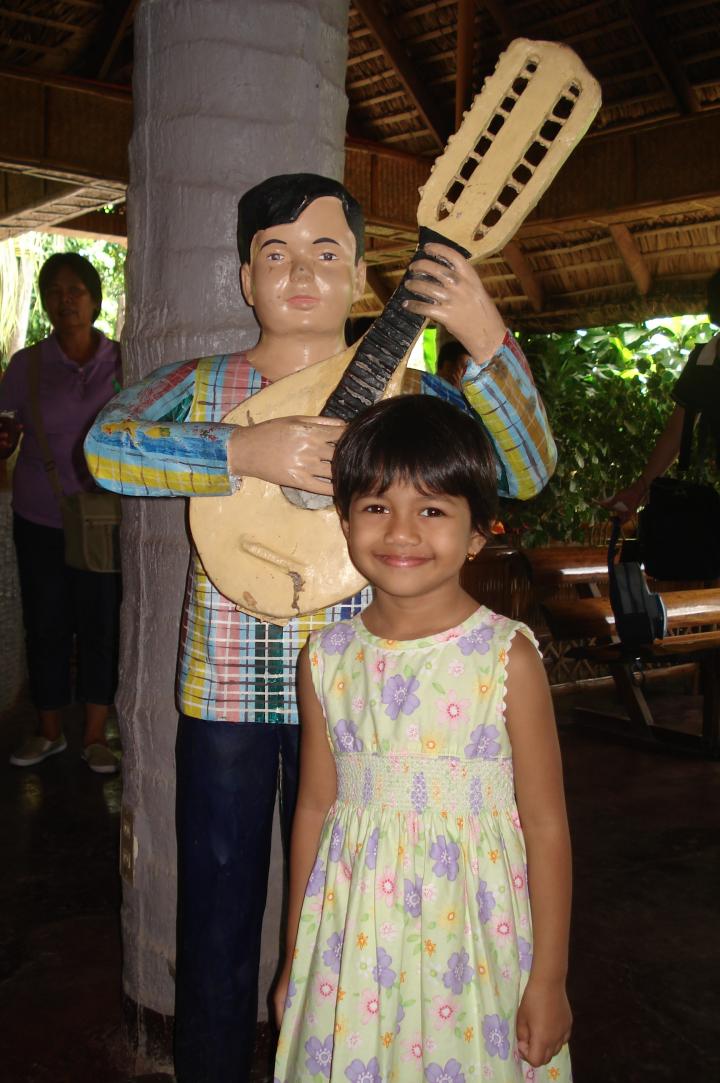 My daughter Kancana Preetika at the entrance to Villa Escudero