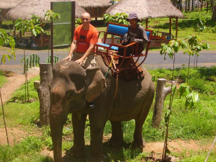 With my Mnong guide on board Elvis the Elephant, the kind of Yok Don National Park. 