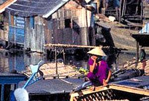 Ben Nghe...is a wholesale market. It's where boats from the Mekong Delta come to unload their produce for the markets around the city.