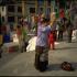 Tibetan pilgrim at the Great Stupa at Boudhnath, the spiritual and commercial center of the Tibetan community in the Kathmandu Valley