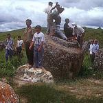 Visitors from nearby Vietnam explore the Plain of Jars