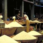 A miniature landscape of rice mountains topped with pure white lilies.