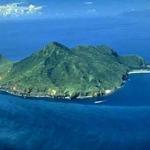 Turtle Mountain Island, located 10 kilometers off the coast of Toucheng in Yilan County, Taiwan, looks like a turtle floating in the sea, hence its name. The island has high cliffs, steaming fumaroles, welling underwater hot springs, mountain peaks, sea-eroded caves, a lake, and unique cliff vegetation, as well as a rich marine ecology. Since the Ching Dynasty, Turtle Mountain Island has been famous for its runrises. The best place to watch this spectacular sunrise is from Toucheng Beach or the mouth of the Lanyang River, between April and September.