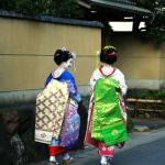 Maiko, or apprentice geisha, making the rounds of the Arashiyama district of Kyoto. 