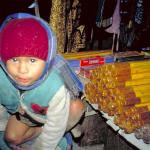 Very young incense vendor along the streets of Thamel.