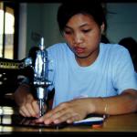 Learning a trade at sewing machines donated by the Norwegian government