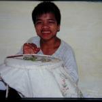 Children of Friendship Village embroider framed pictures for shops in Hanoi