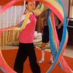 A student gracefully practices banner swirling, at the Children's Palace. Shanghai, China.