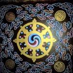 Rumtek, Sikkim, India: A "Wheel of Life" mandala adorns the entrance  to Rumtek Monastery.