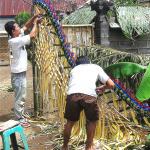 The front gate of a family compound in Bali is decorated for a wedding.
