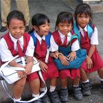 Little girls greet me as I enter an elementary school in Bali. 