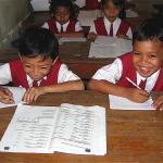 These boys are hard at work taking a test. 