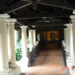 Colonnaded esplanade leading between the two pools. Beginning in 1996, under the sponsorship of Raffles International Limited, the main building was renovated, restored, and refurbished.