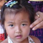 Vendor’s child, Central market, Phnom Penh, Cambodia.