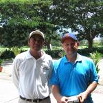 My husband with his golf caddy in Kota Kinabula
