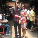 A couple in Chinatown, dressed in the height of fashion