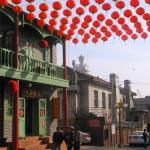 Street scene. Note Jesus w/ arms outspread.