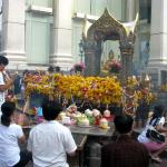 Devotees pay homage to Phra Phrom at Erawan Shrine