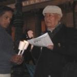 Poetic Justice: Sin Kye (immediate right) reads out a tribute to Cyclone Nargis victims 