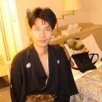 Me in hotel room putting on kimono