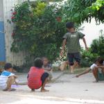 Children play on the grounds home to Partners In Compassion.