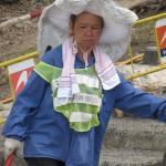 Street cleaners in Hong Kong have unique headgear. 
