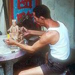 Wood carver at work.