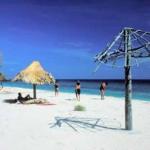 METINARO, EAST TIMOR. A beach shelter overlooks the crystal-clear waters of the Savu Sea, at "Dollar Beach".