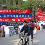 A variety of student associations at Beijing University's main plaza, in Beijing 29 September 2004, begin the yearly recruitment drive for new students, as school administrators are encouraging some of the 4,000 foreign students at the presitigious university to join the associations as a way to better integrate with Chinese students. China is expecting a record number of students to enrol in its universities this year as foreigners seek to cash in on the country's booming economy by becoming proficient in Mandarin, and of the anticipated 86,000 foreign students, an overwhelming number will come from Asian countries with close economic, trade and cultural ties with Beijing.
