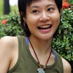 Singaporean Au Tak Lam, a 24-year-old computer engineer student, matches her swanky outfits with jade amulets, while colourful crystals adorn her nimble fingers.