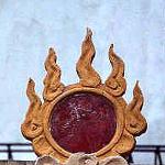 'Flaming sun' adorns a temple roof in the Old Quarter, Hanoi, Vietnam.