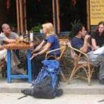 Backpackers take a break on the eve of war.