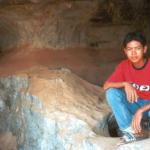 Dee poses inside one of the caves near Kampot, Cambodia.