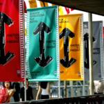 Thais walk past rows of banners and signs advertising the Bangkok International Film Festival.