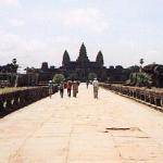 Siem Reap, Cambodia. Like many temples in Southeast Asia, Angkor Wat remains a living part of the local culture and economy. Once inside the outer wall, you are liable to see Cambodian peasants mowing the grass - with sickles. It is a daunting undertaking, and the resulting heaps of hay will be hauled out to feed livestock.