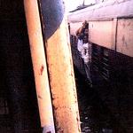 Bombay, India. Bombay's commuter trains, enormous though they be, strain under the weight of Bombay's explosive population.