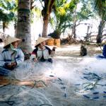 A hard days darning the fishing nets.