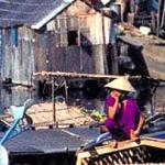 Ben Nghe...is a wholesale market. It's where boats from the Mekong Delta come to unload their produce for the markets around the city.
