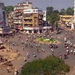 Day or night, Ho Chi Minh City is full of life. The swimming pool at the New World Hotel looks down on the swarm of bicyclists.