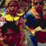 Young Shan males entering monastery for the first time, dressed in finery to resemble princes. Held once a year in March/April in Thailand and Burma.