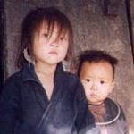 Two young Hmong children in Sapa Valley village.