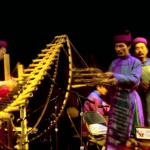 An ensemble of eight musicians introduces the performance on traditional instruments.