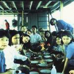 Thais will eat just about anywhere. Here they eat on mats laid out on the floor of a boat already embarked.