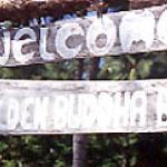 A hand-made sign greets visitors to the island.