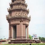 Phnom Penh, Cambodia. This Khmer-style monument was constructed by the French upon the granting of Cambodia's independence. At night, it is illuminated in the red, white, and deep blue colors of Cambodia's flag.