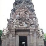 Phimai, Thailand: The main tower, built of white sandstone during the 11th and 12th centuries, features garuda caryatids, antefixes of hooded serpents, and a lotus-bulb filial. Bas-reliefs and lintels depict dancing Sivas, scenes from the Ramayana and the Buddha's life.