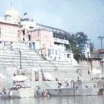 Lining the holy river are buildings like these, the bottoms of their long stairs reaching well below the surface. People come here to wash, frolic, or sit in quiet contemplation.