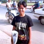 Tee, my regular newspaper vendor.